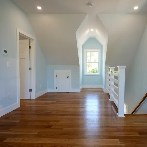Finished upstairs room with dormer and hardwood floor