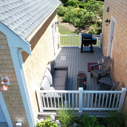 Deck with outdoor seating and grill