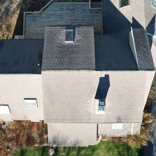 Aerial view of a new roof and back deck
